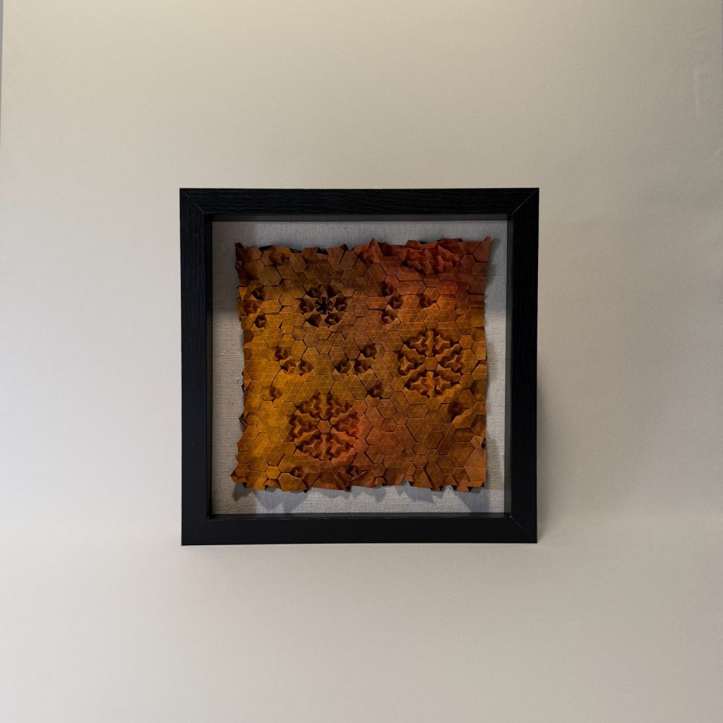 framed origami tessellation by Charlie Weitzenberg